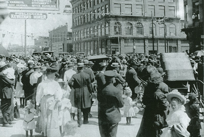 Fourth of July scene in 1909 at 6th and Oak Streets, Red Jacket, Michigan