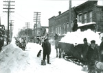 Winter snow removal scene, looking north on Fifth Street, Red Jacket, Michigan