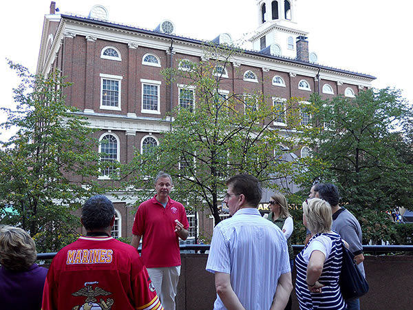 tour group hearing about Faneuil Hall